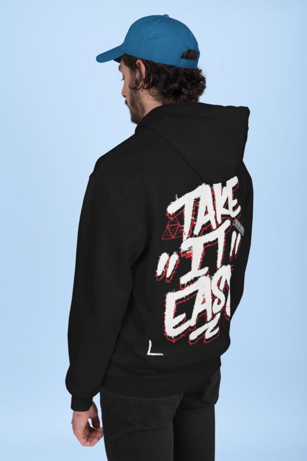 back of a hoodie mockup featuring a man at a studio 28315