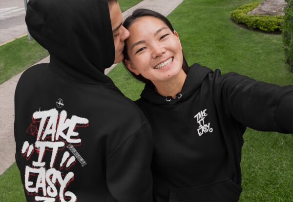 front and back mockup of an affectionate couple wearing customizable hoodies 29774